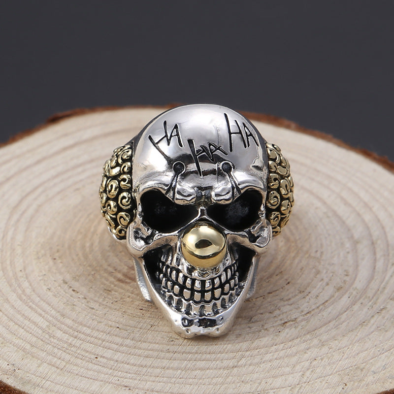 S925 sterling silver evil clown ring showing detailed skull structure, filigree sides and two-tone gothic finish