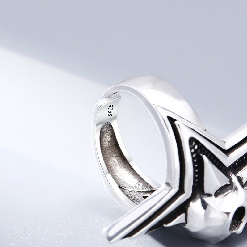 Side profile of S925 sterling silver five-pointed star skull ring showing authentic S925 stamp oxidized detail and band construction