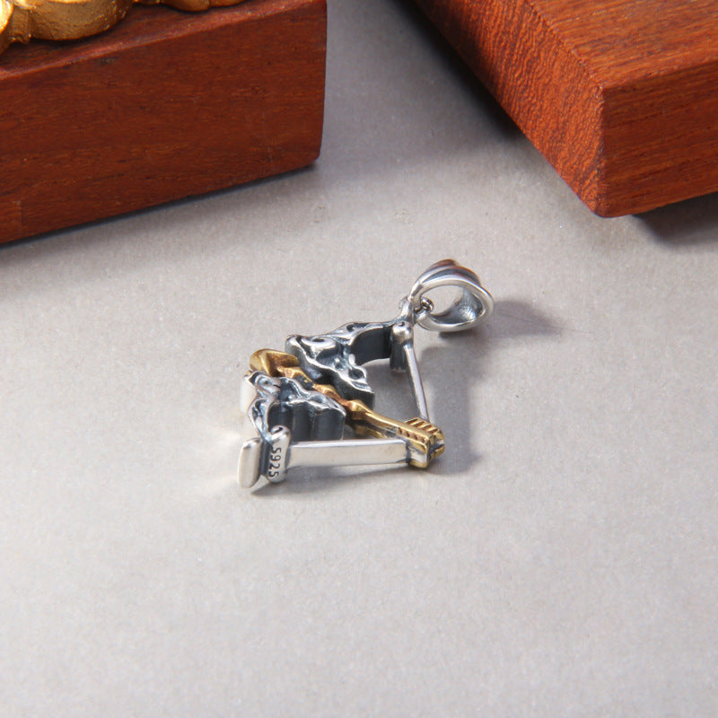 S925 sterling silver medieval archer bow arrow pendant laying flat showing authentic S925 stamp brass arrow detail and oxidized finish