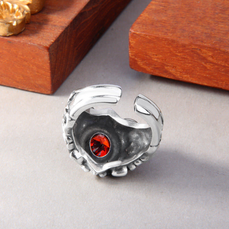 S925 sterling silver baroque ring showing adjustable band interior, red zircon from reverse and oxidized scrollwork detail