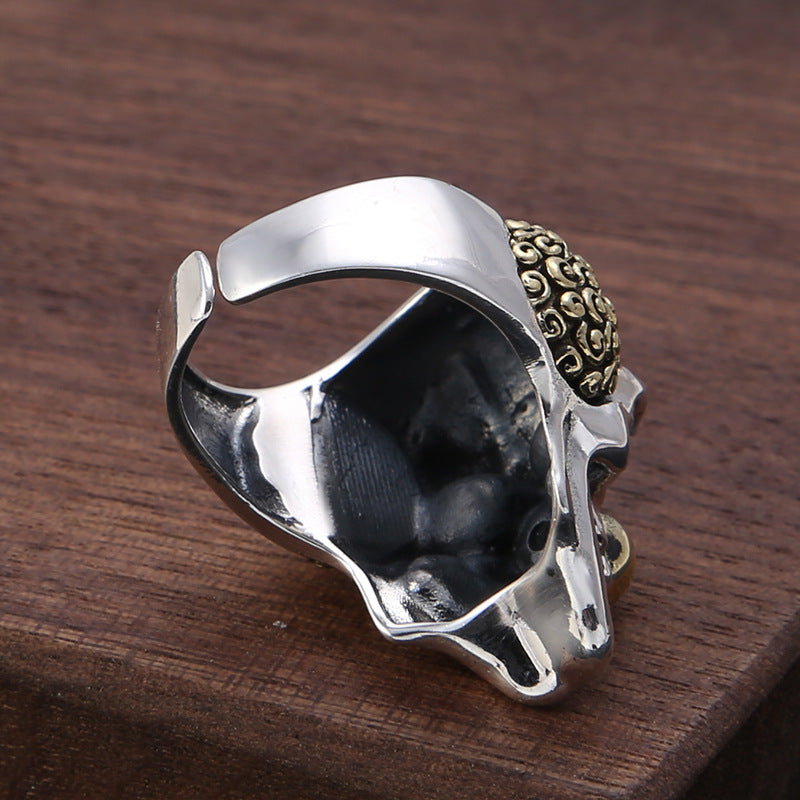 S925 sterling silver evil clown skull ring side view showing hollow eye sockets, adjustable band and dimensional sculpting