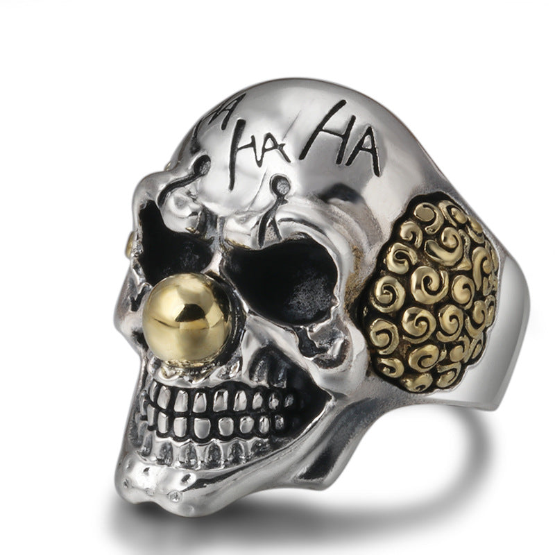 S925 sterling silver evil clown skull ring on white background showing HA HA engraving, gold nose and ornate filigree detail