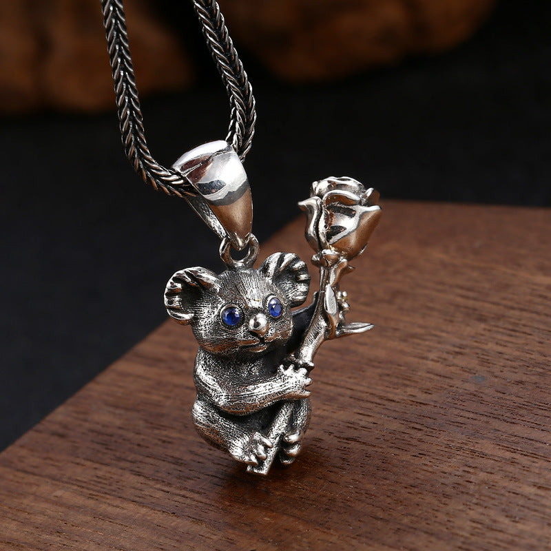 S925 sterling silver koala rose pendant on wheat chain showing blue gemstone eye and polished bail