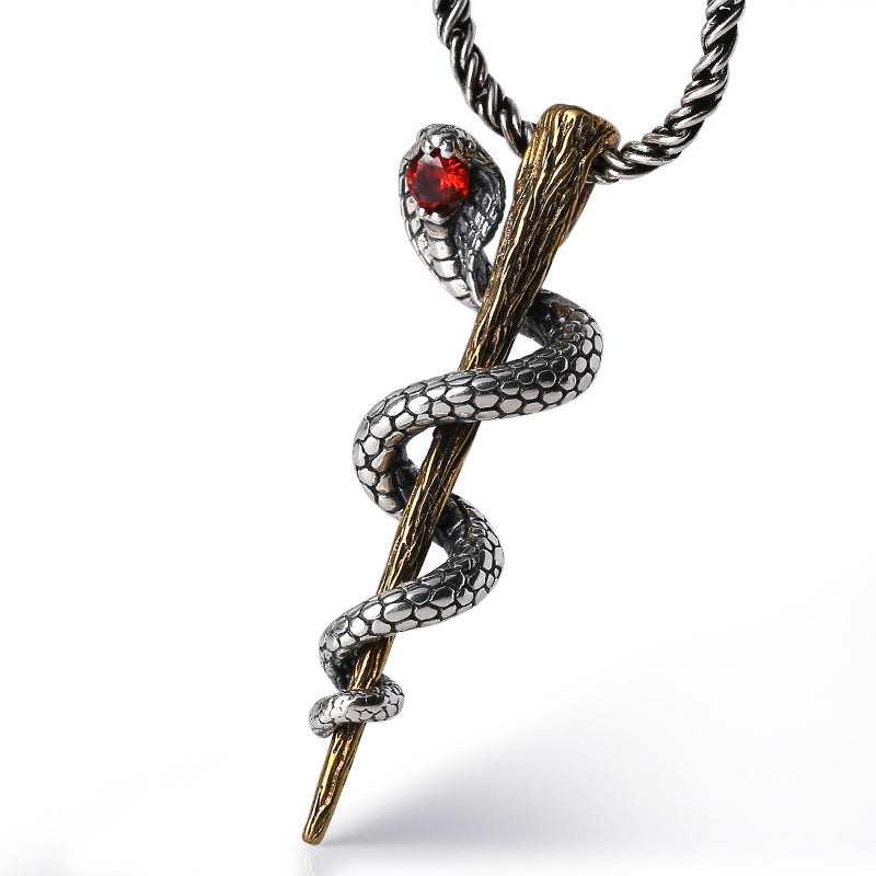 S925 sterling silver serpent staff pendant with red zircon gemstone and vintage Thai silver on white background