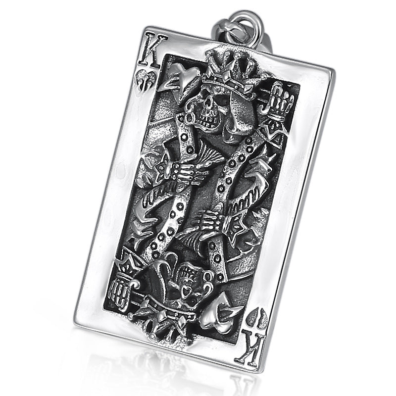 S925 sterling silver skeleton king card pendant on white background showing detailed crowned skull, ornate frame and oxidized gothic finish