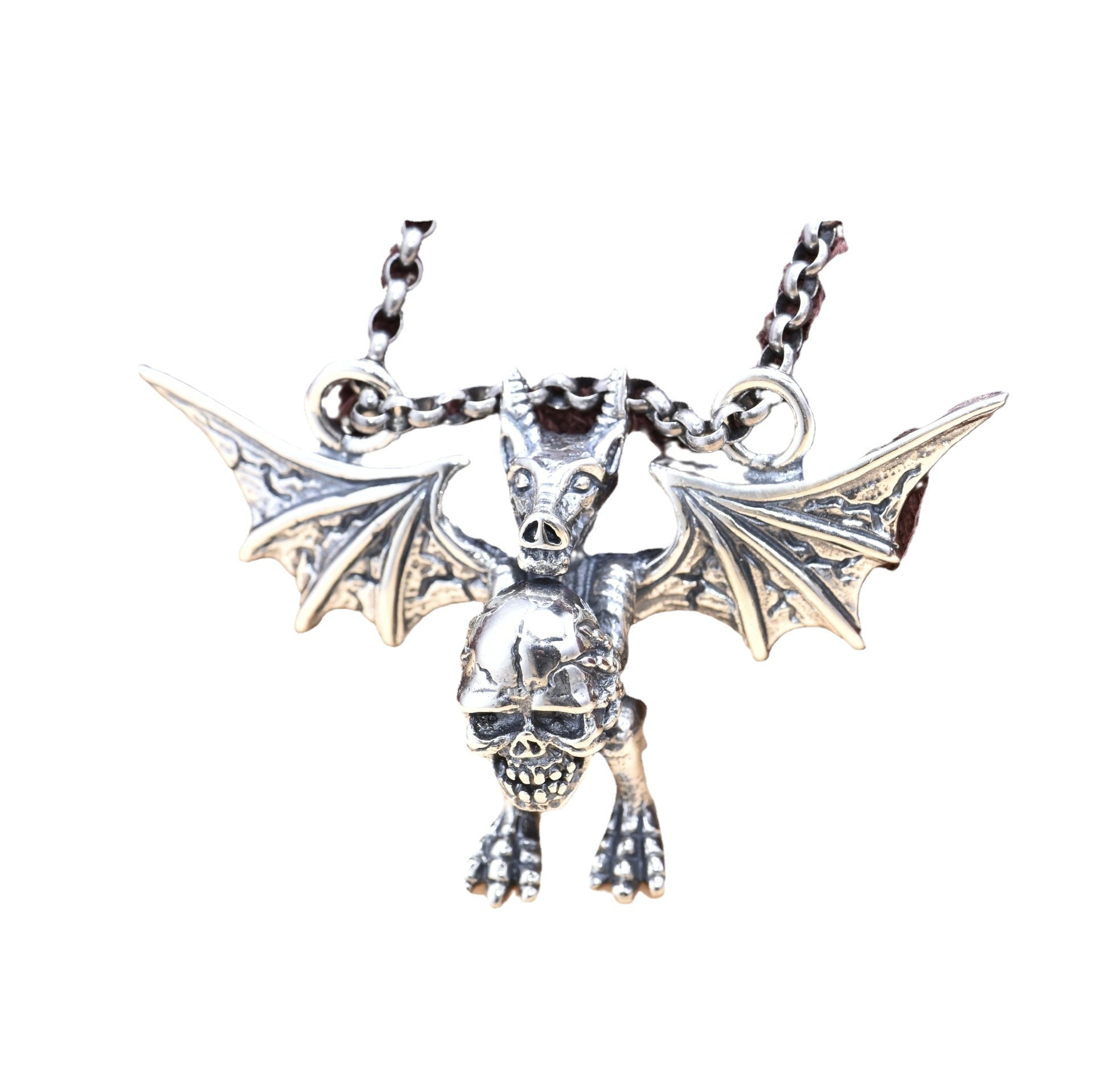 S925 sterling silver winged demon skull pendant with gothic bat wings and oxidized finish on white background