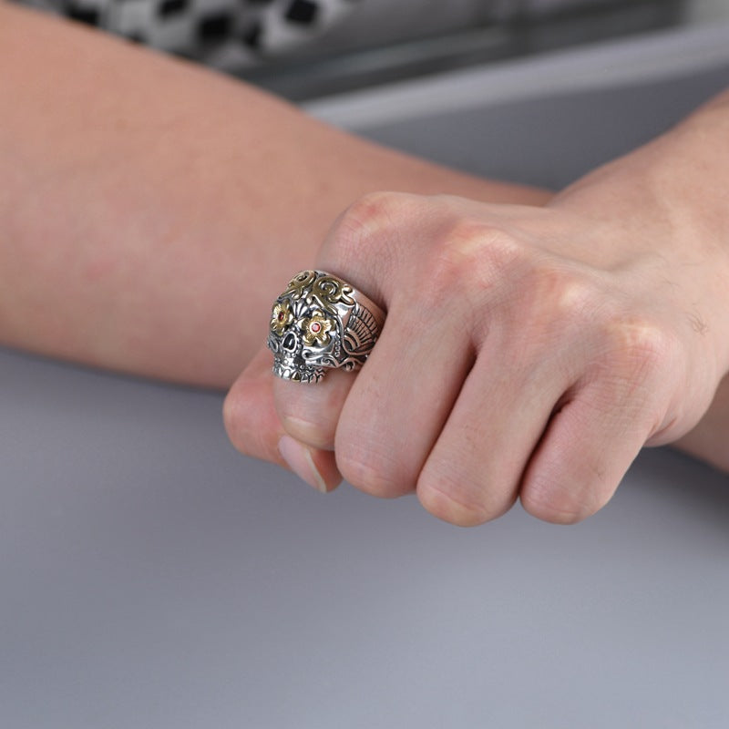 S925 sterling silver sugar skull ring worn on hand showing statement size, Day of the Dead design and bold gothic style