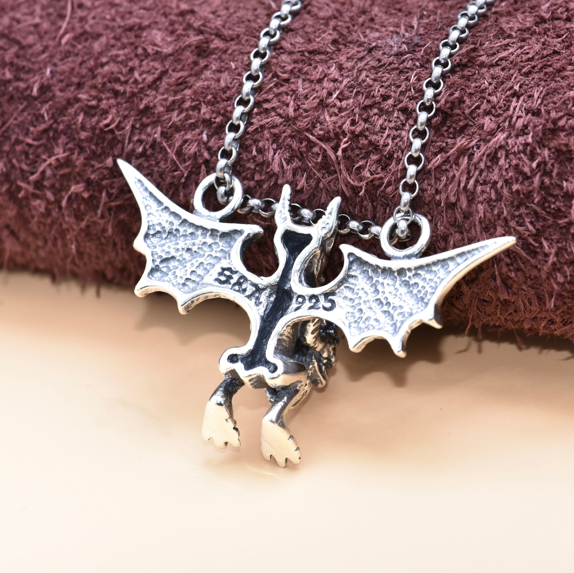 S925 sterling silver winged demon skull pendants back showing 43mm wingspan 27g weight and gothic bat wing craftsmanship