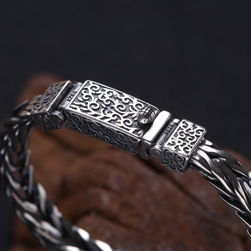 S925 sterling silver bracelet clasp macro view showing detailed engraved motif and premium finish