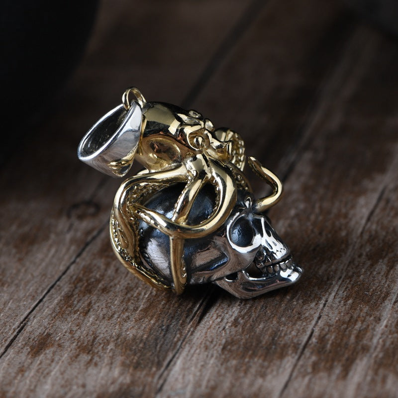 S925 sterling silver octopus skull pendant on dark wood surface showing intricate tentacle wrapping and contrasting oxidized details
