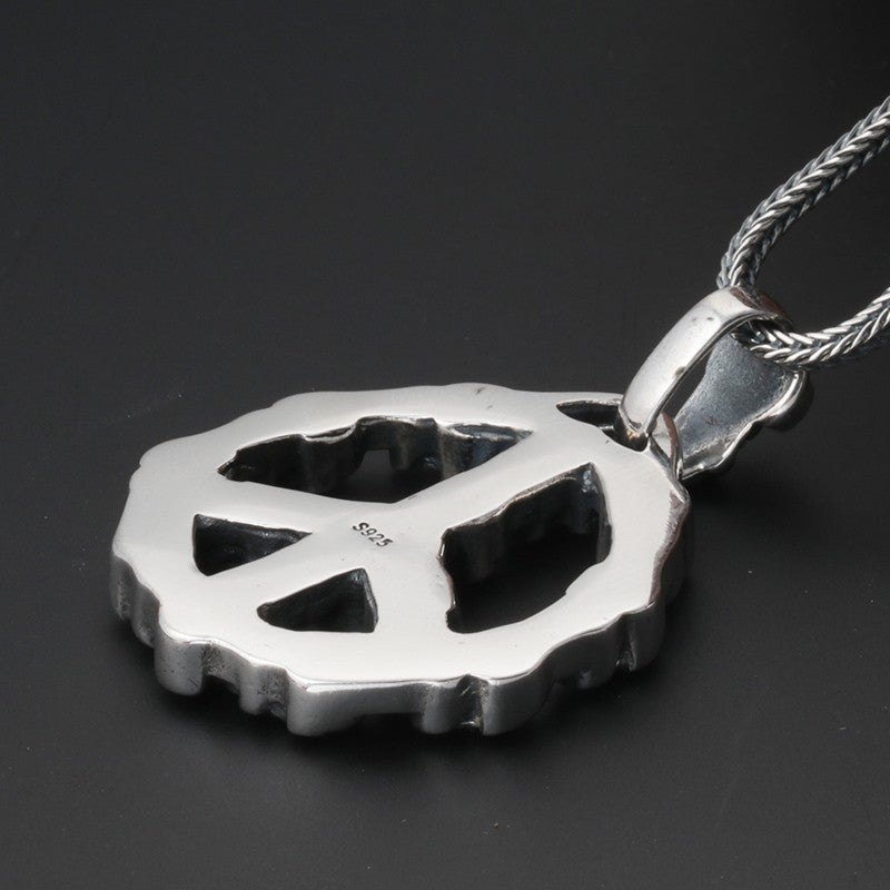 S925 sterling silver peace symbol pendant reverse view on dark background showing solid construction, polished finish and bail detail