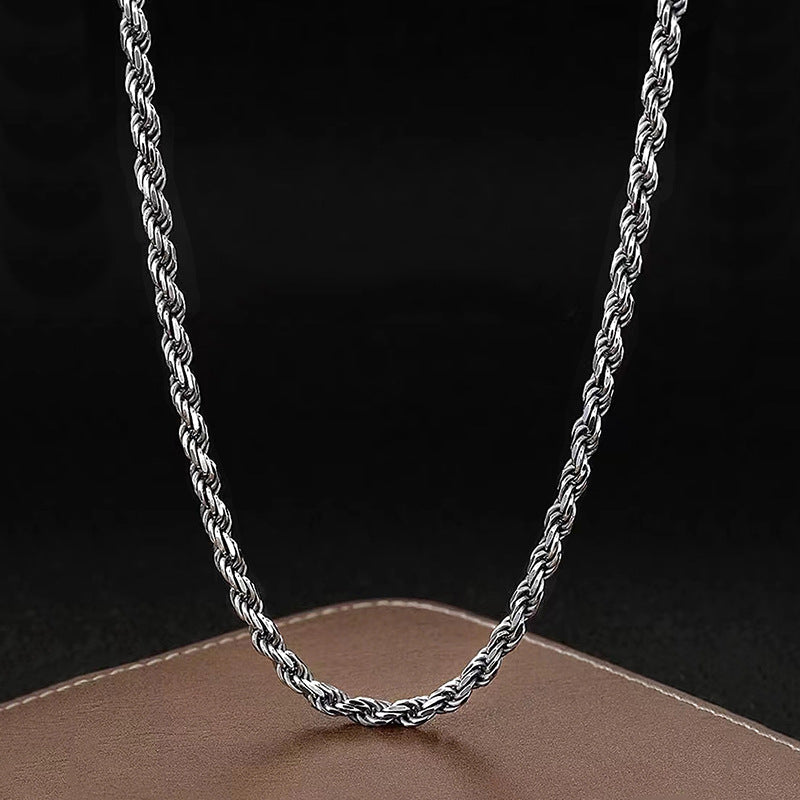 S925 sterling silver rope chain on black background showing dimensional twist pattern and premium polished finish