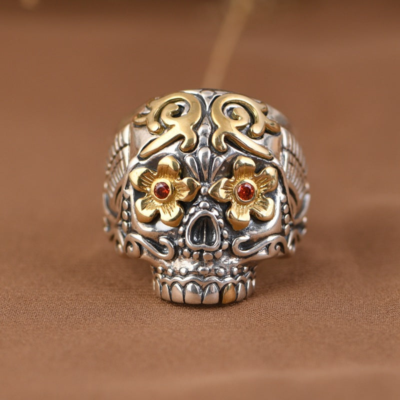 S925 sterling silver sugar skull ring front view showing detailed floral pattern, copper flowers and sparkling zircon eye stones