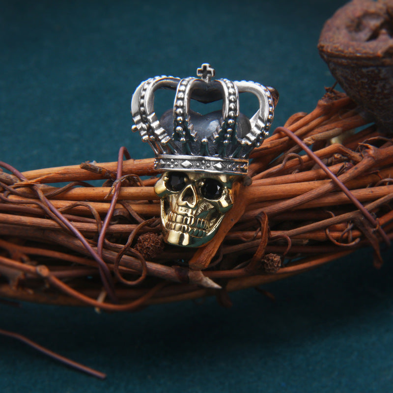 S925 sterling silver crown pendant with brass skull displayed on rope showing royal authority symbolism