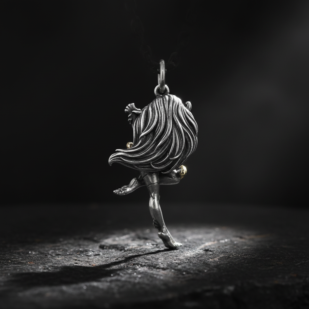 Sterling silver crescent moon sorceress pendant back view on dark background showing Gothic witch silhouette with flowing hair and cape detai