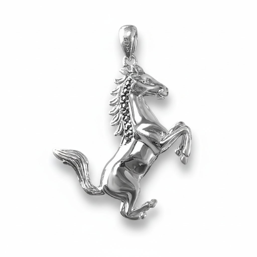 S925 sterling silver rearing stallion pendant on white background showing detailed athletic horse in dynamic pose with textured mane, muscular form, polished finish, and natural shadow