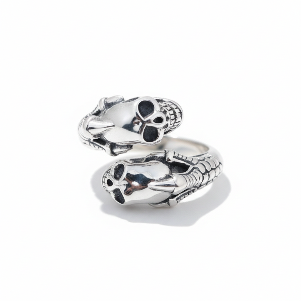 S925 sterling silver double skull and claw adjustable ring on white background showing Gothic open design and oxidized finish
