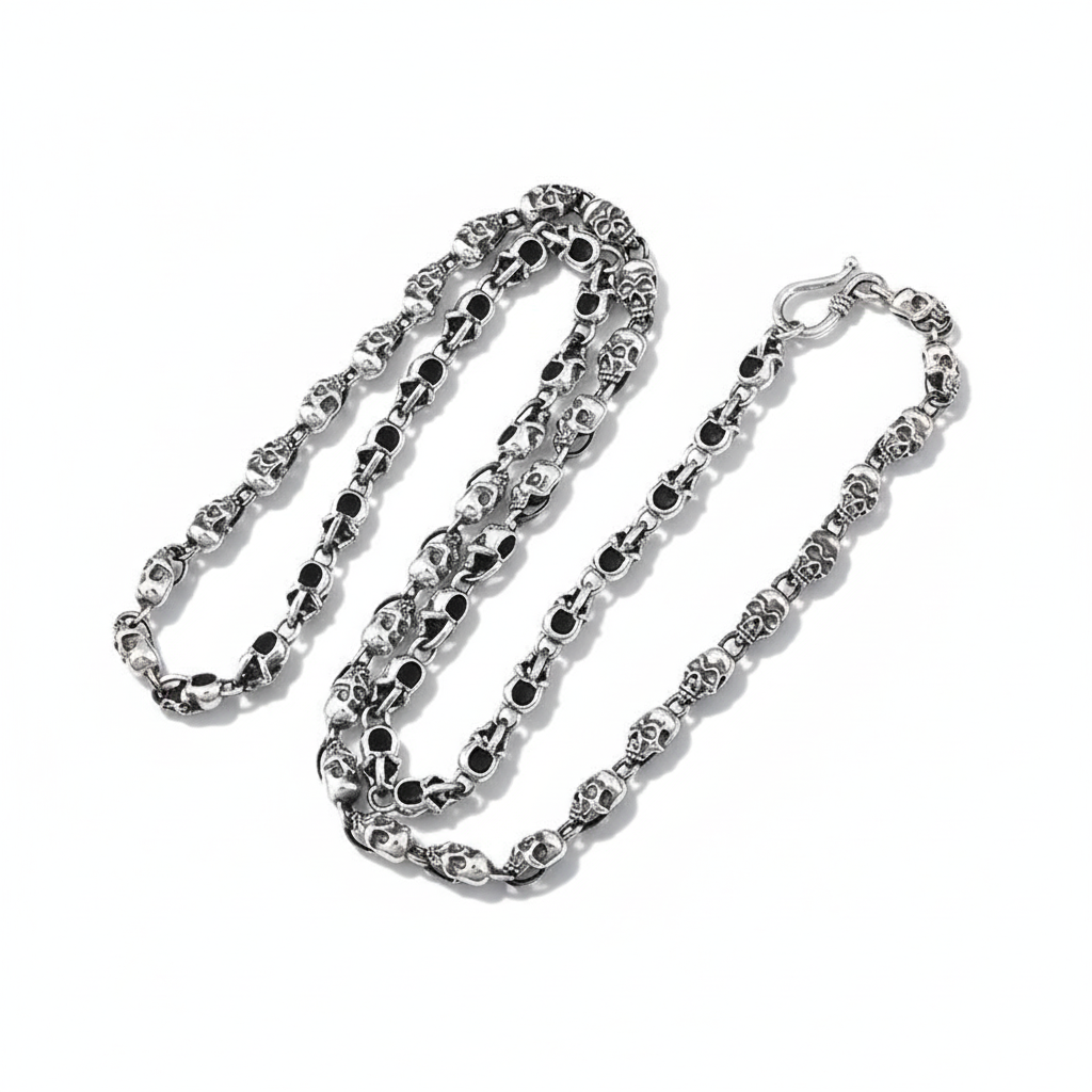 S925 sterling silver skull chain necklace on white background showing bold 6mm links with detailed skull design and oxidized finish