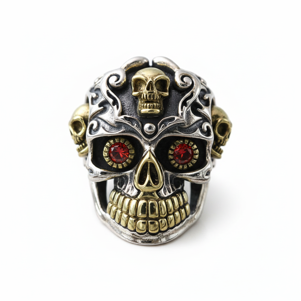 S925 sterling silver skull ring on white background showing zircon eyes, brass crown accents and oxidized finish